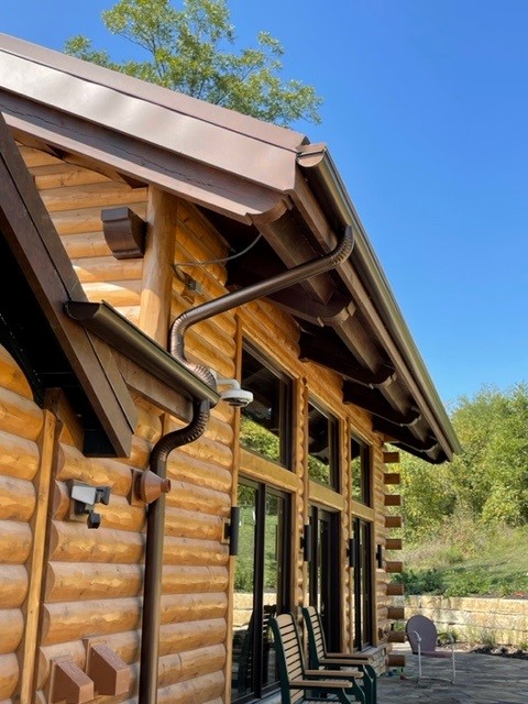rustic-copper-half-round-gutter-installation-on-log-cabin