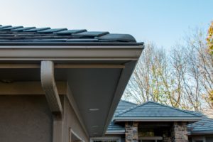 Concrete Tile Roof with Charcoal gutter protection on Lake Home in Lees Summit, Missouri