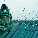 Picture of rain on window demostrates need for gutter protection