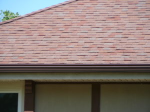 Red Brown Roof with Royal Brown Gutter Cover Installled