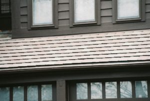 Close up view of tile roof in Mission Hills, Kansas with Gutter Cover Installed
