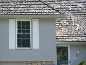 Wood Roof In Lees Summit, Missouri with Bronze Gutter Cover