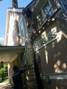 large ladder to complete gutter cover install