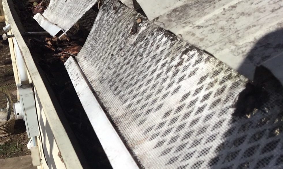 Improperly installed gutter filters will not solve guttering problems. The leaf filter is too short for the gutter and not properly attached allowing debris to enter gutter.