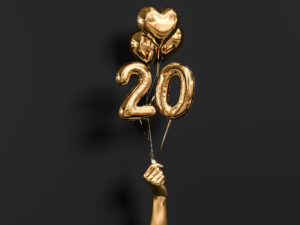 gold-balloons-in-the-shape-of-the-number-20-to-celebrate-gutter-cover-kc-20-year-anniversary
